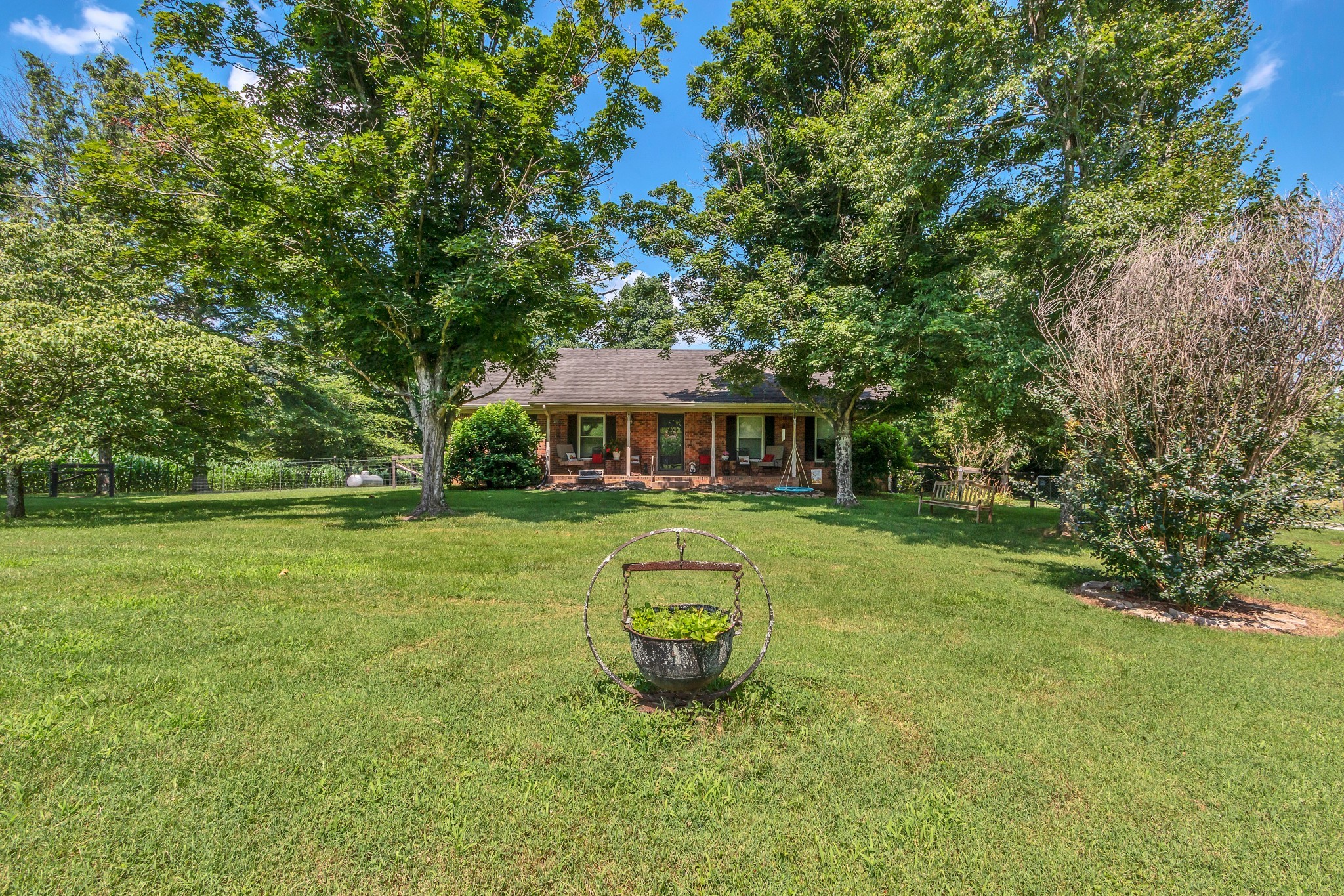 3349 Sweeney Hollow Road Franklin, TN 37064 - Photo 12 of 41 a front view of a house with a yard