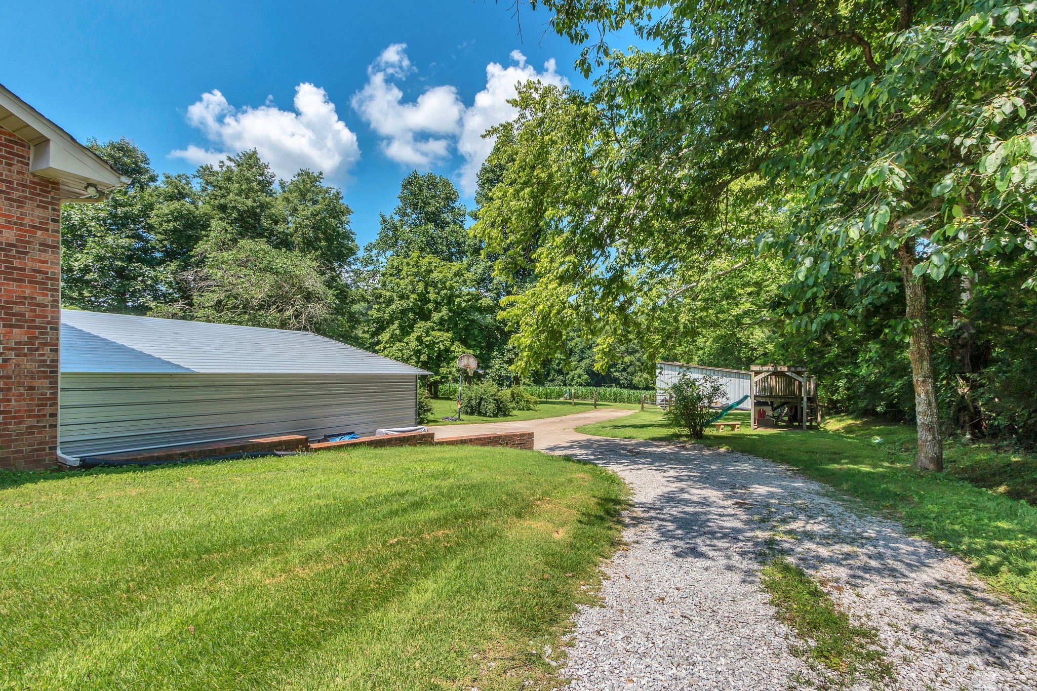 3349 Sweeney Hollow Road Franklin, TN 37064 - Photo 17 of 41 a backyard of a house with lots of green space