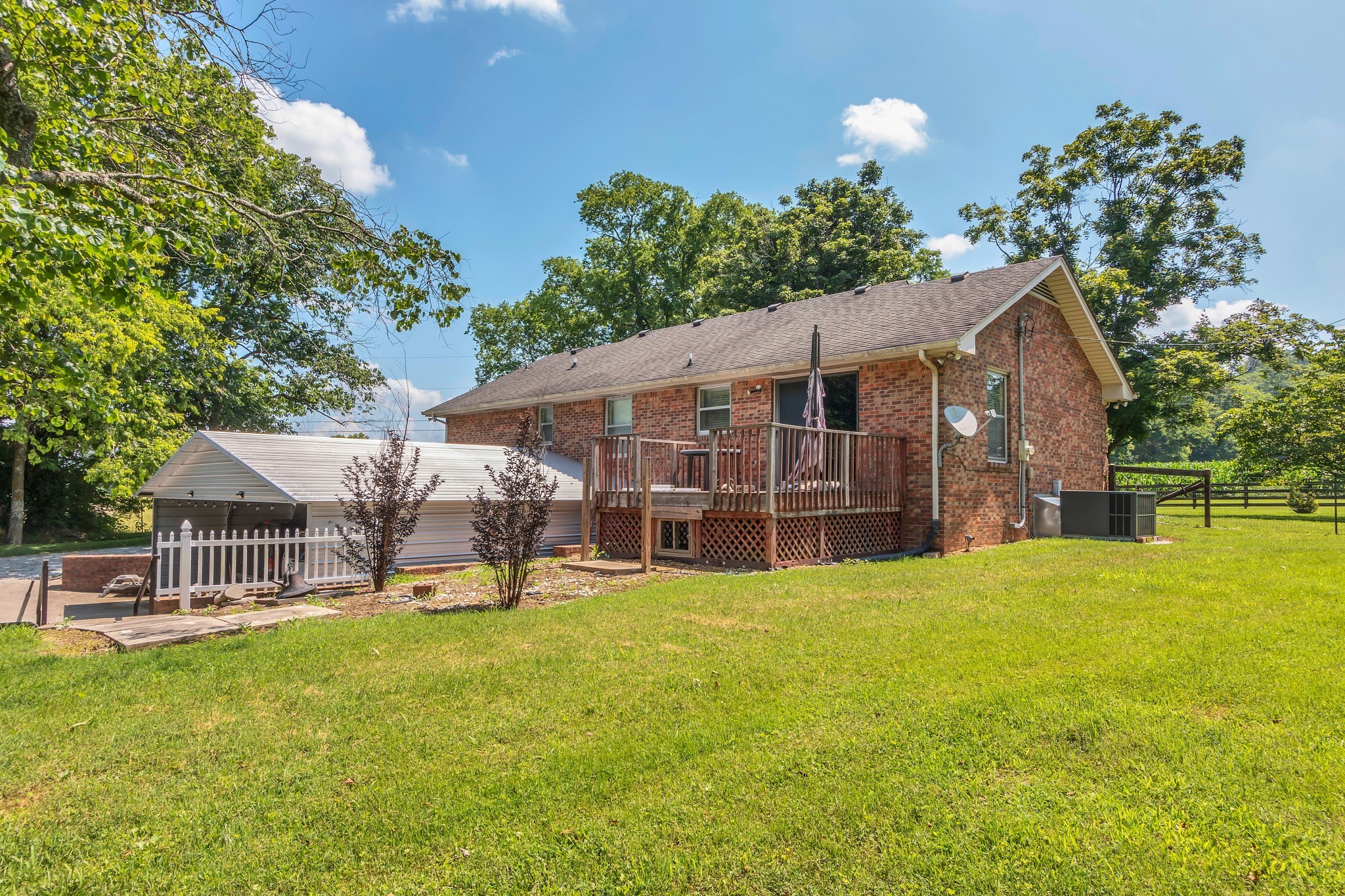 3349 Sweeney Hollow Road Franklin, TN 37064 - Photo 18 of 41 a view of a house with a yard porch and sitting area