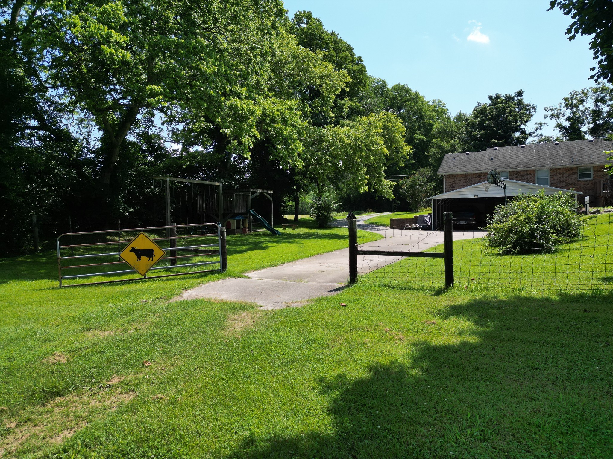 3349 Sweeney Hollow Road Franklin, TN 37064 - Photo 36 of 41 a park view with a bench and trees