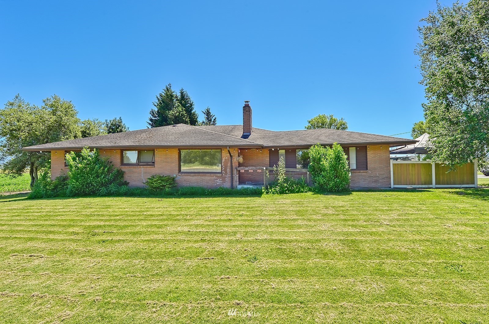 2287 Slater Road Ferndale, WA 98248 - Photo 1 of 19 a front view of a house with a yard