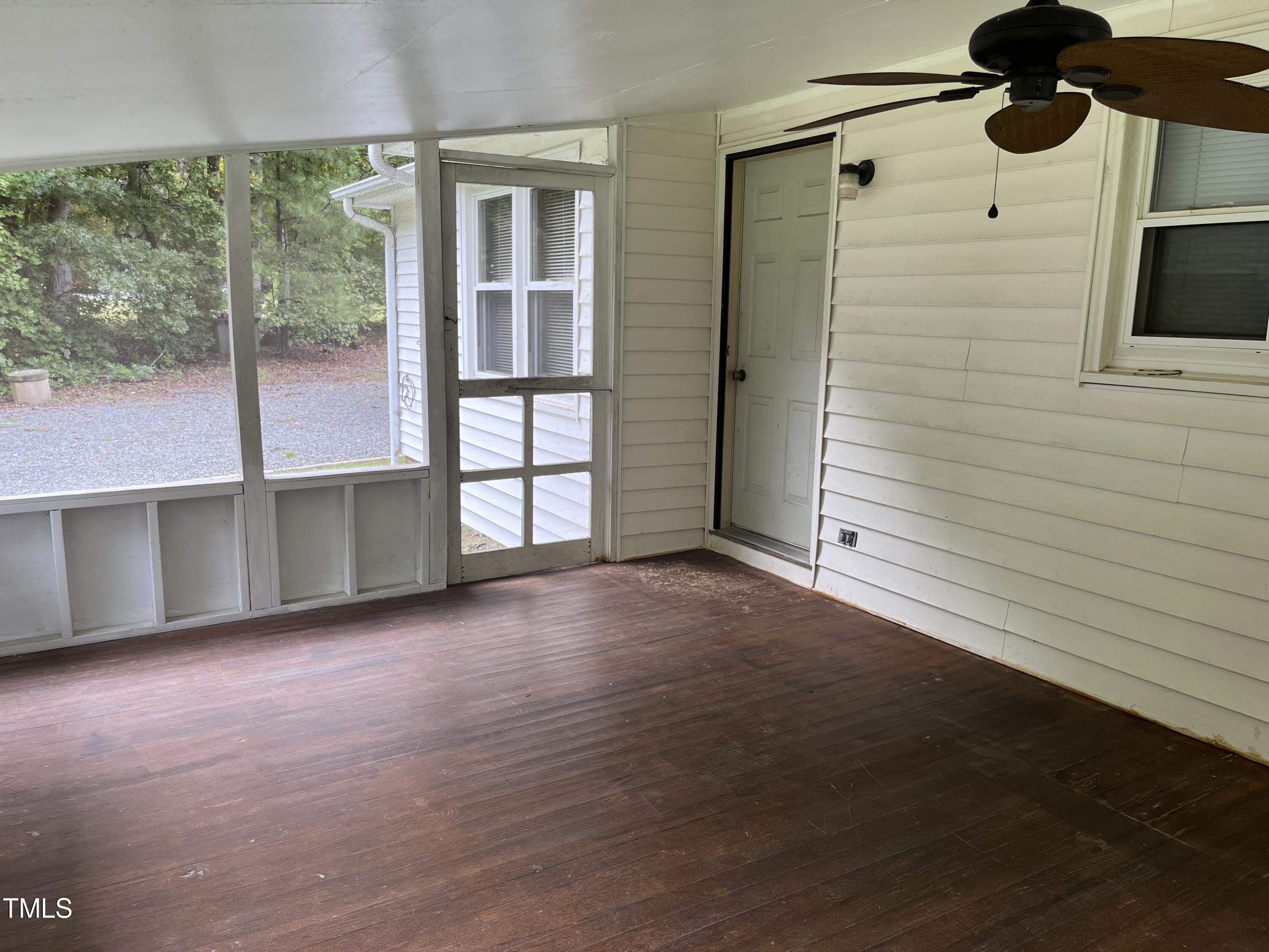 3143 Hester Road Creedmoor, NC 27522 - Photo 10 of 21 an empty room with windows
