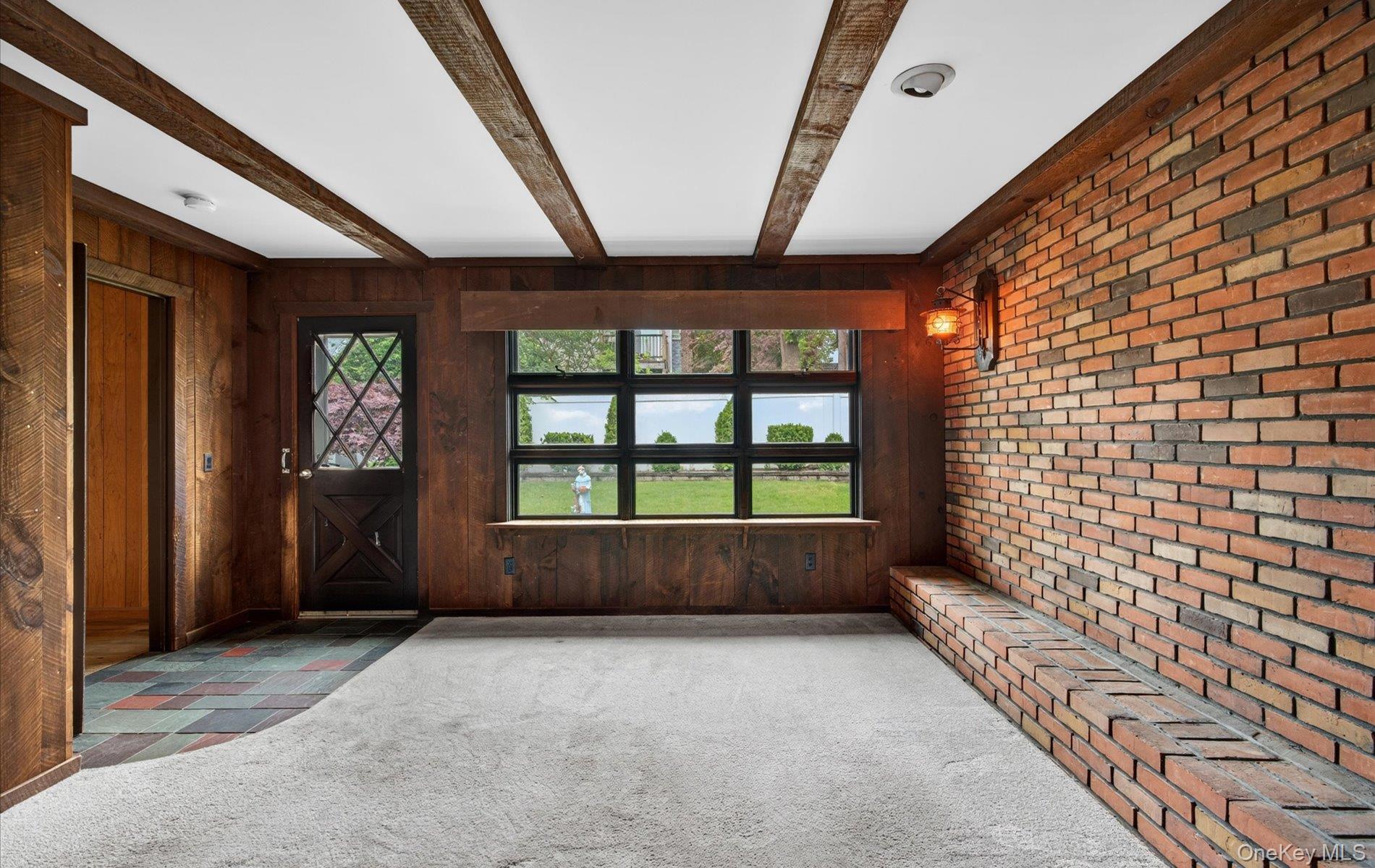 24 Purdue Road Glen Cove, NY 11542 - Photo 12 of 41 an empty room with windows