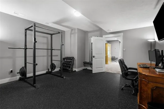 a view of a workspace with gym equipment