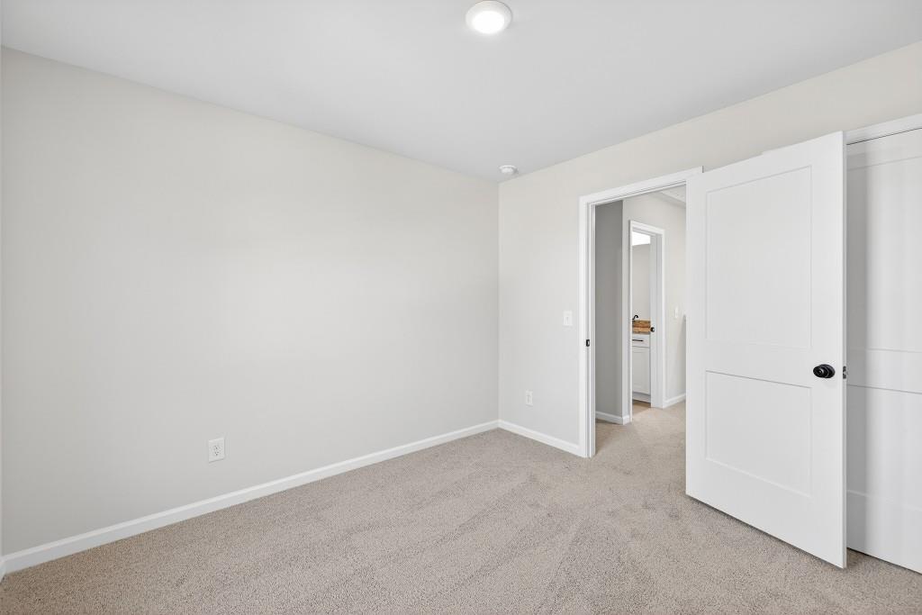 578 Madison Street, Unit 100 Commerce, GA 30529 - Photo 20 of 37 a view of an empty room