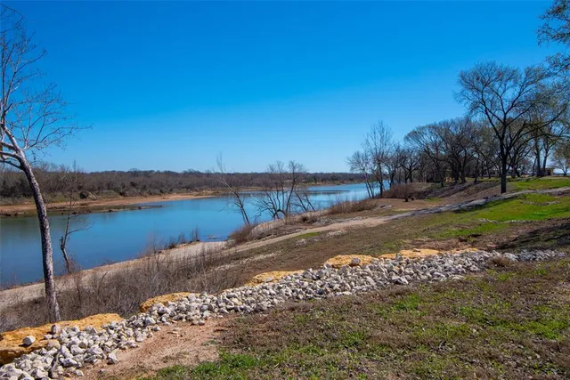 a view of empty room with wooden ceiling
