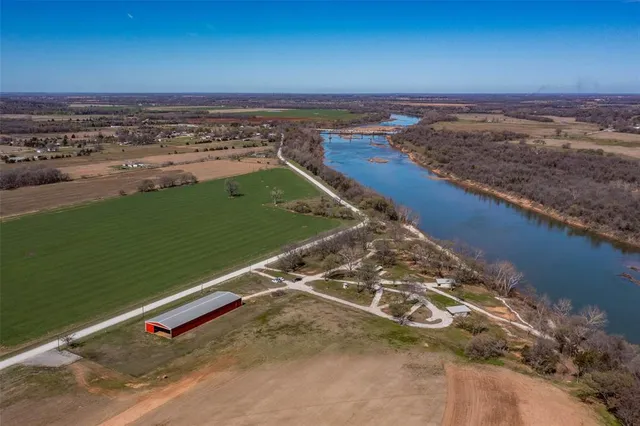 an aerial view of a yard with ocean view