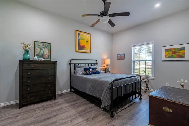 a bed room with furniture and a window