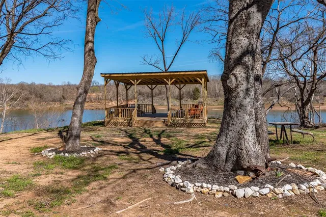a view of a swimming pool with a patio