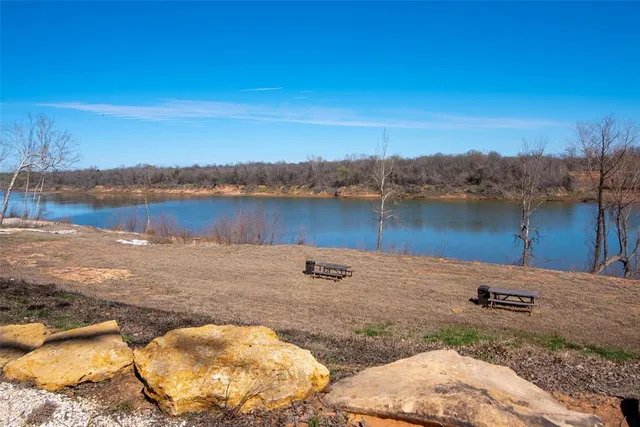 a view of a lake with a mountain