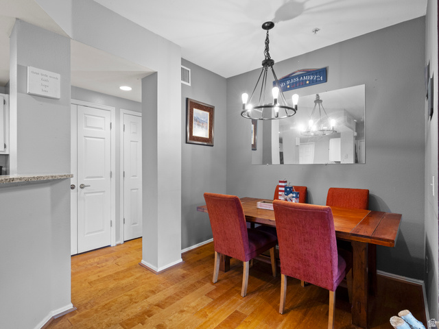 900 Bitner Road, Unit D 34 Park City, UT 84098 - Photo 7 of 25 Dining room with light wood finished floors and suspended lighting