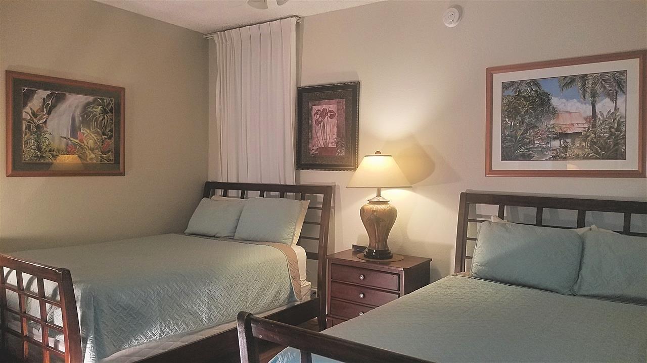 4299 Lower Honoapiilani Road, Unit 134 Lahaina, HI 96761 - Photo 17 of 29 a bedroom with bed and window