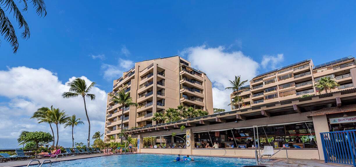 4299 Lower Honoapiilani Road, Unit 134 Lahaina, HI 96761 - Photo 21 of 29 a front view of a building with streets and trees