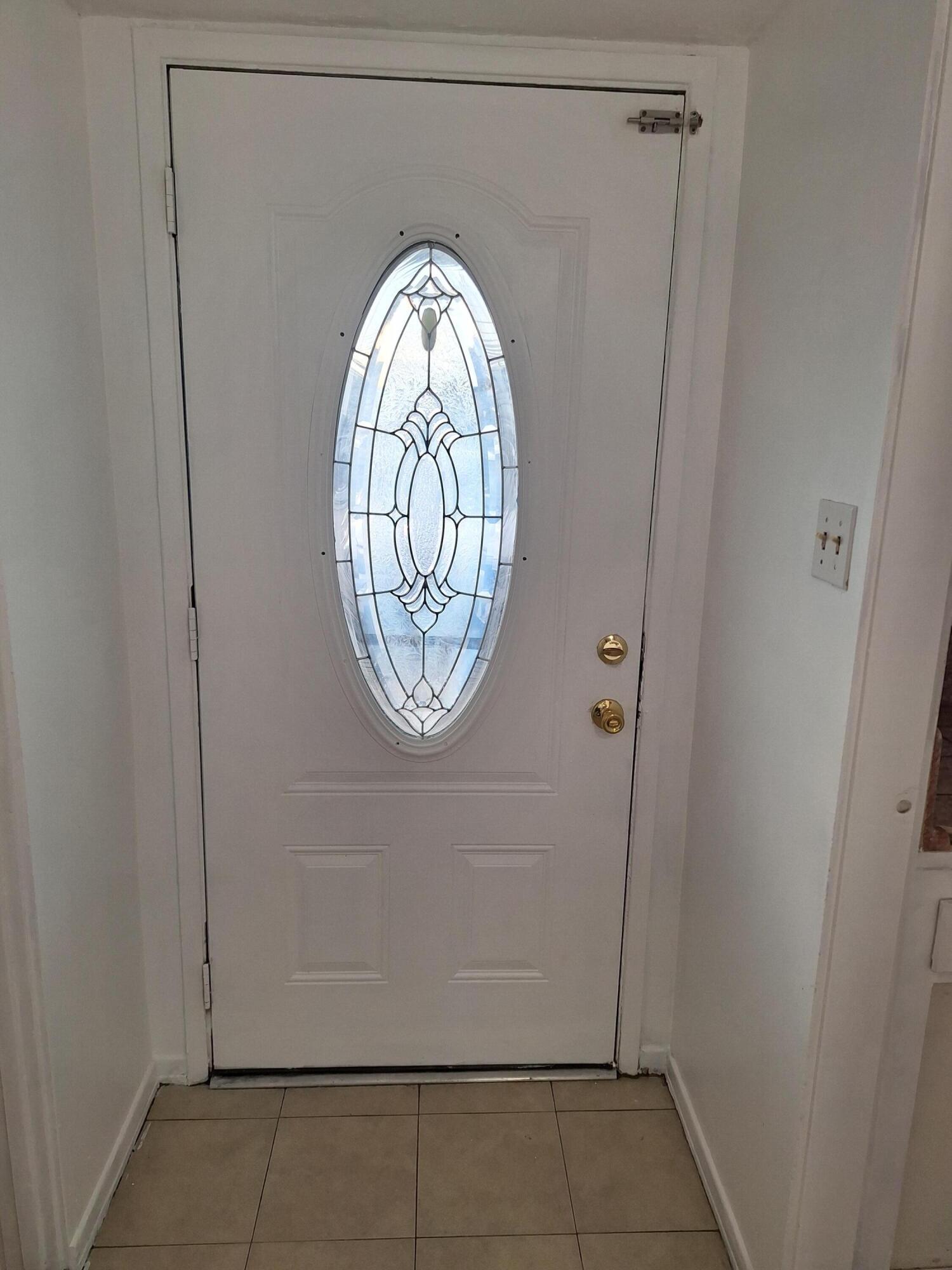 424 North Second Street Lompoc, CA 93436 - Photo 16 of 21 a view of a storage & utility room with a window