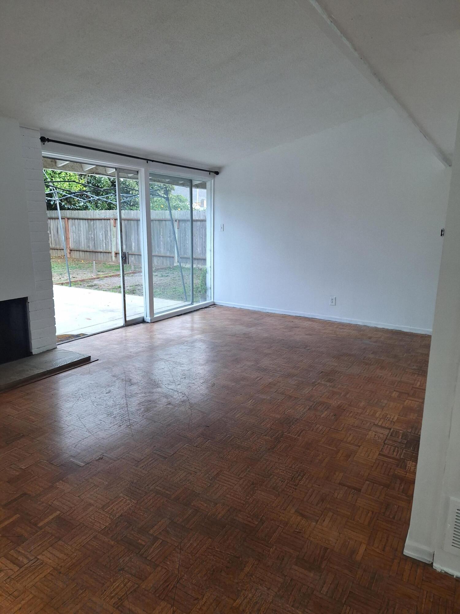 424 North Second Street Lompoc, CA 93436 - Photo 5 of 21 a view of an empty room with a window