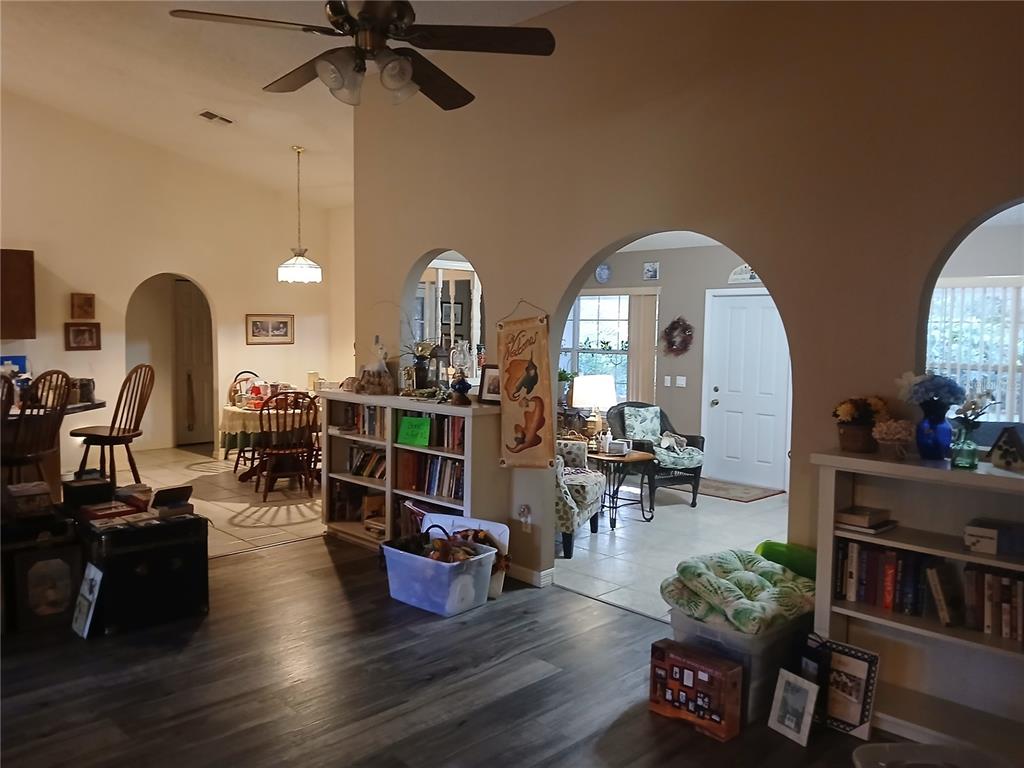 5497 West C Road Bushnell, FL 33513 - Photo 15 of 15 a living room with furniture and a wooden floor