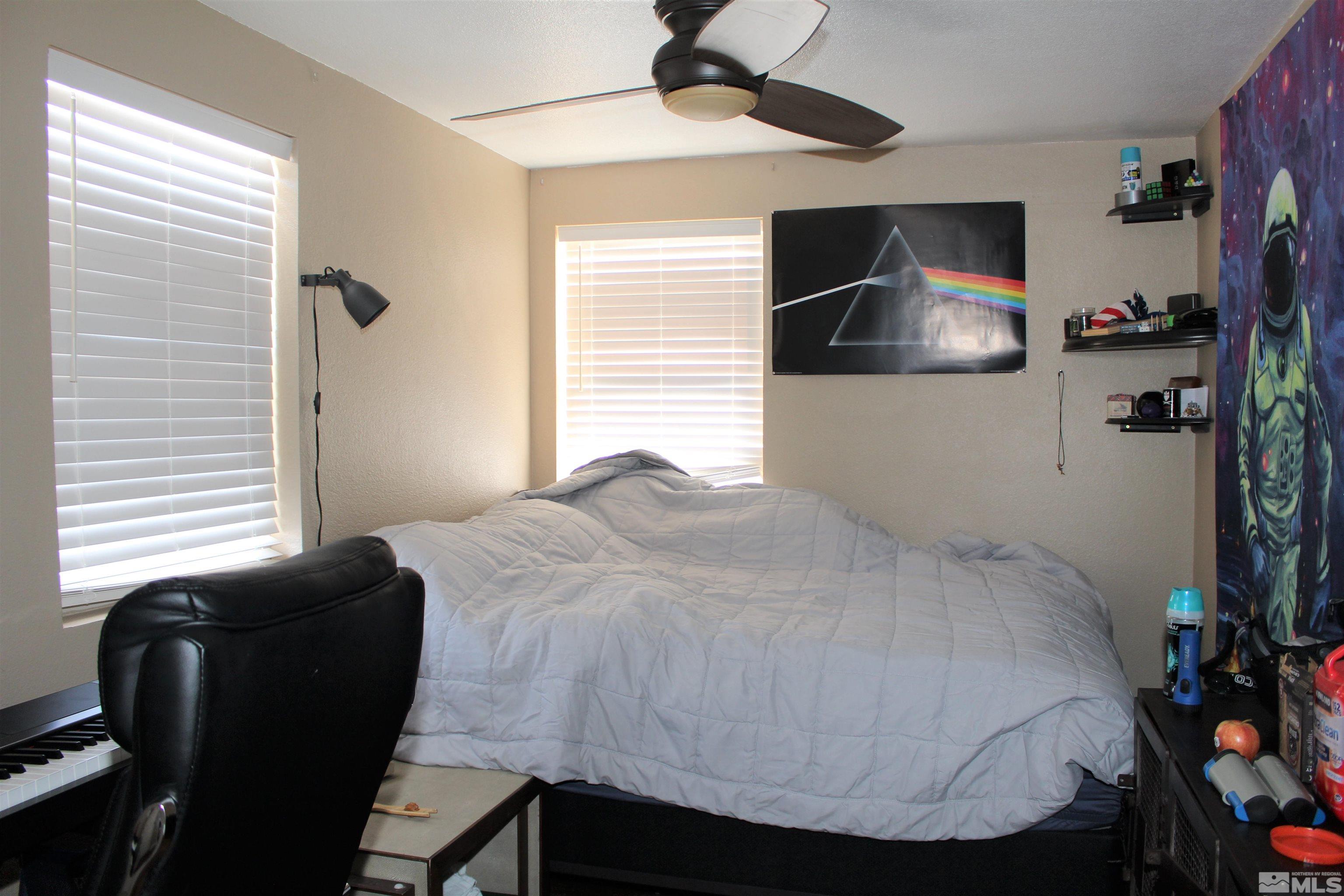 918 Washington Street Reno, NV 89503 - Photo 16 of 34 a bedroom with a bed and a television