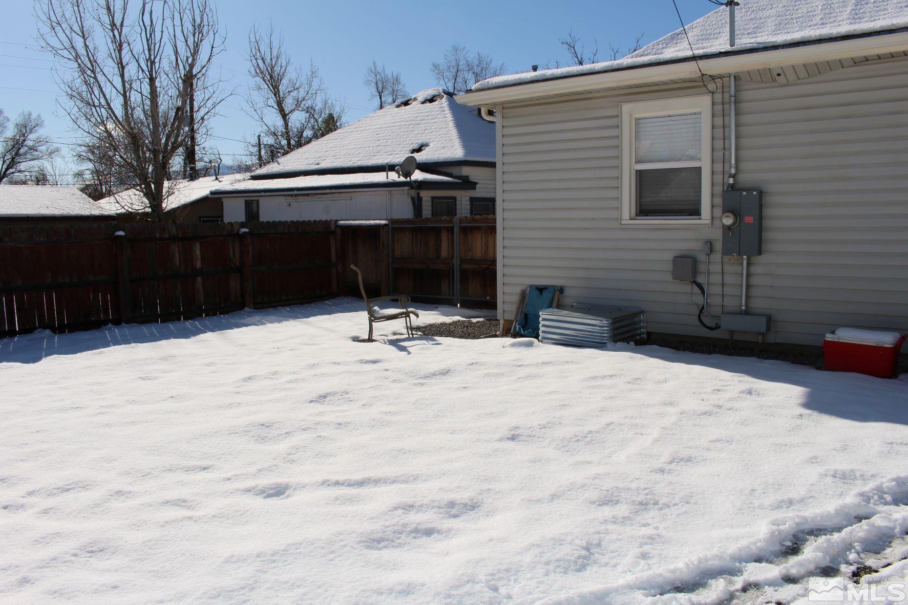 918 Washington Street Reno, NV 89503 - Photo 21 of 34 a backyard of a house with table and chairs