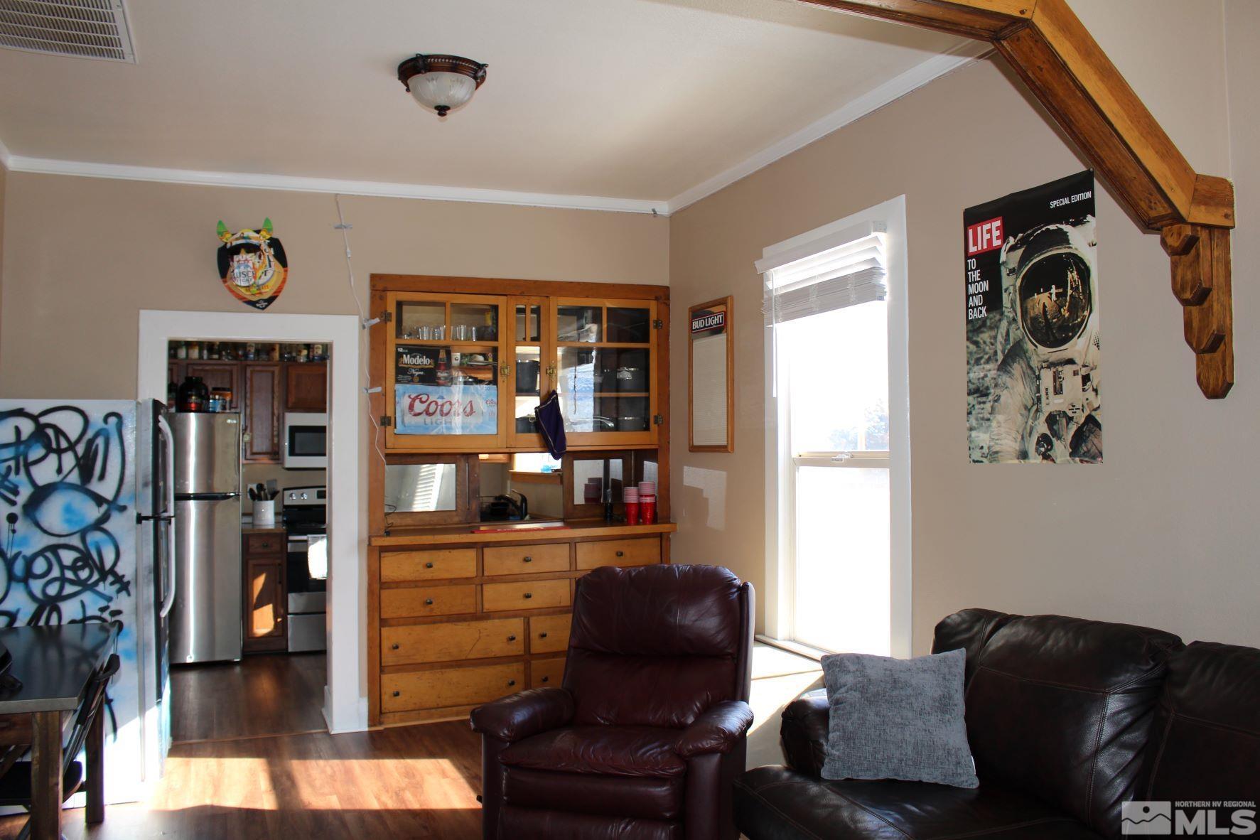 918 Washington Street Reno, NV 89503 - Photo 3 of 34 a living room with furniture and wooden floor