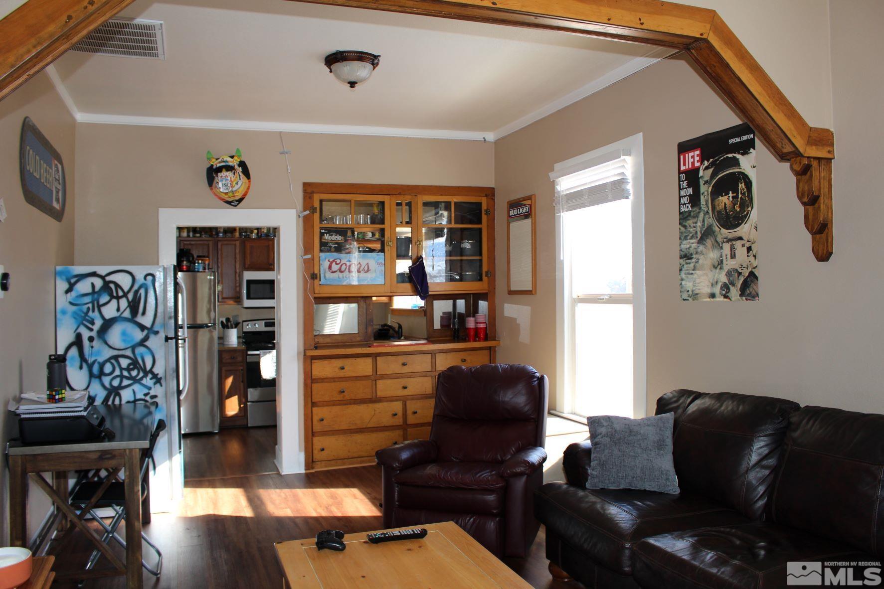 918 Washington Street Reno, NV 89503 - Photo 4 of 34 a living room with furniture and wooden floor