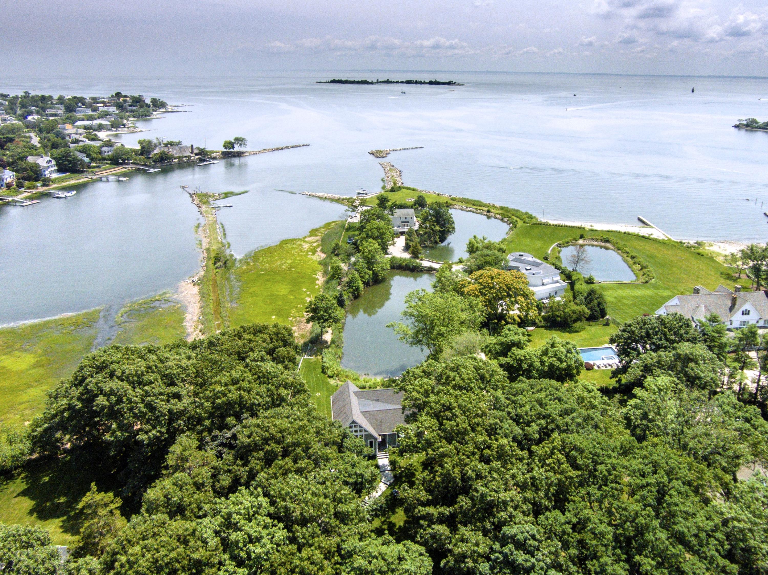 52 Shorehaven Road Westport, CT 06880 - Photo 1 of 37 a view of a lake with a lake in the background