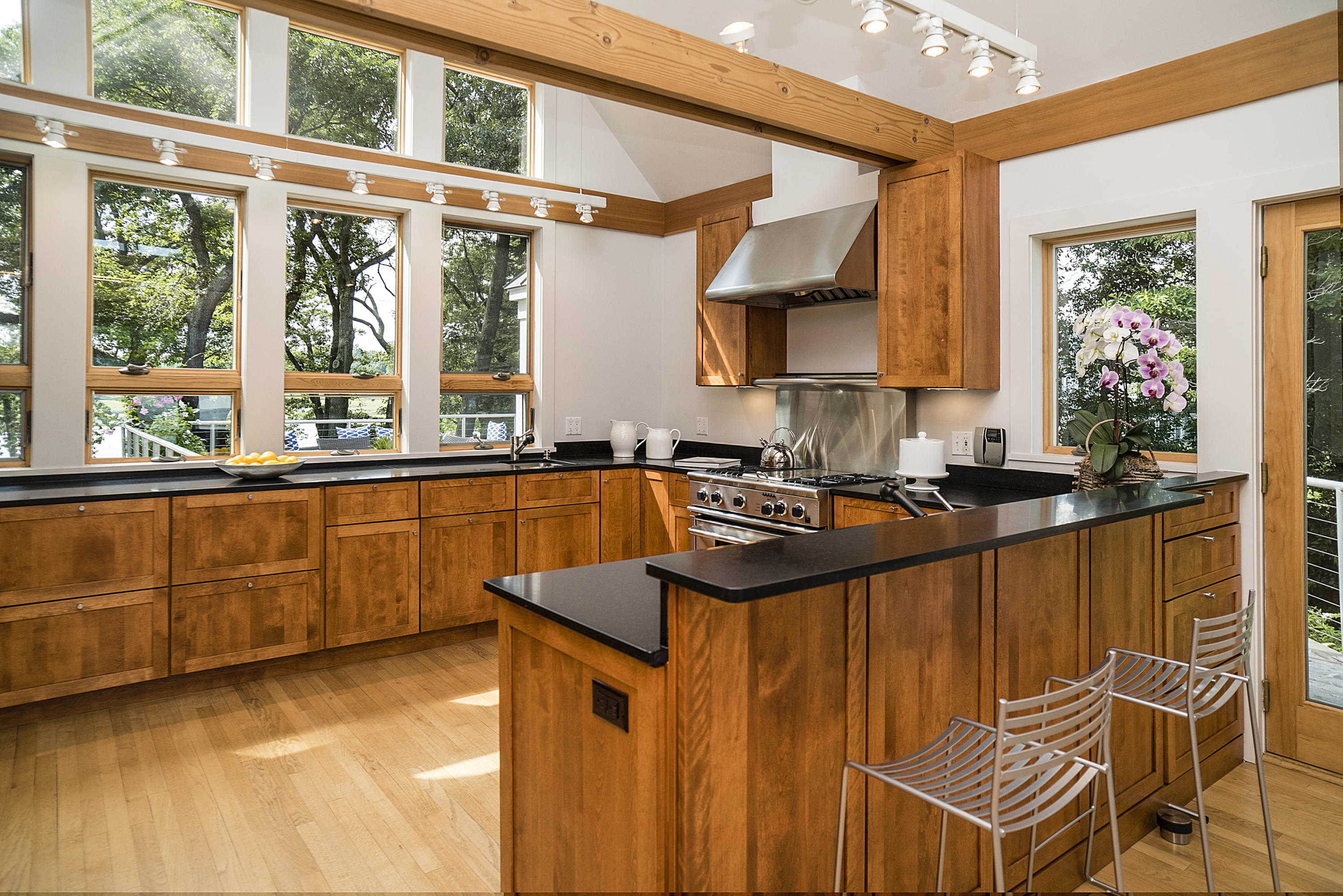 52 Shorehaven Road Westport, CT 06880 - Photo 14 of 37 a kitchen with granite countertop a sink and a stove top oven