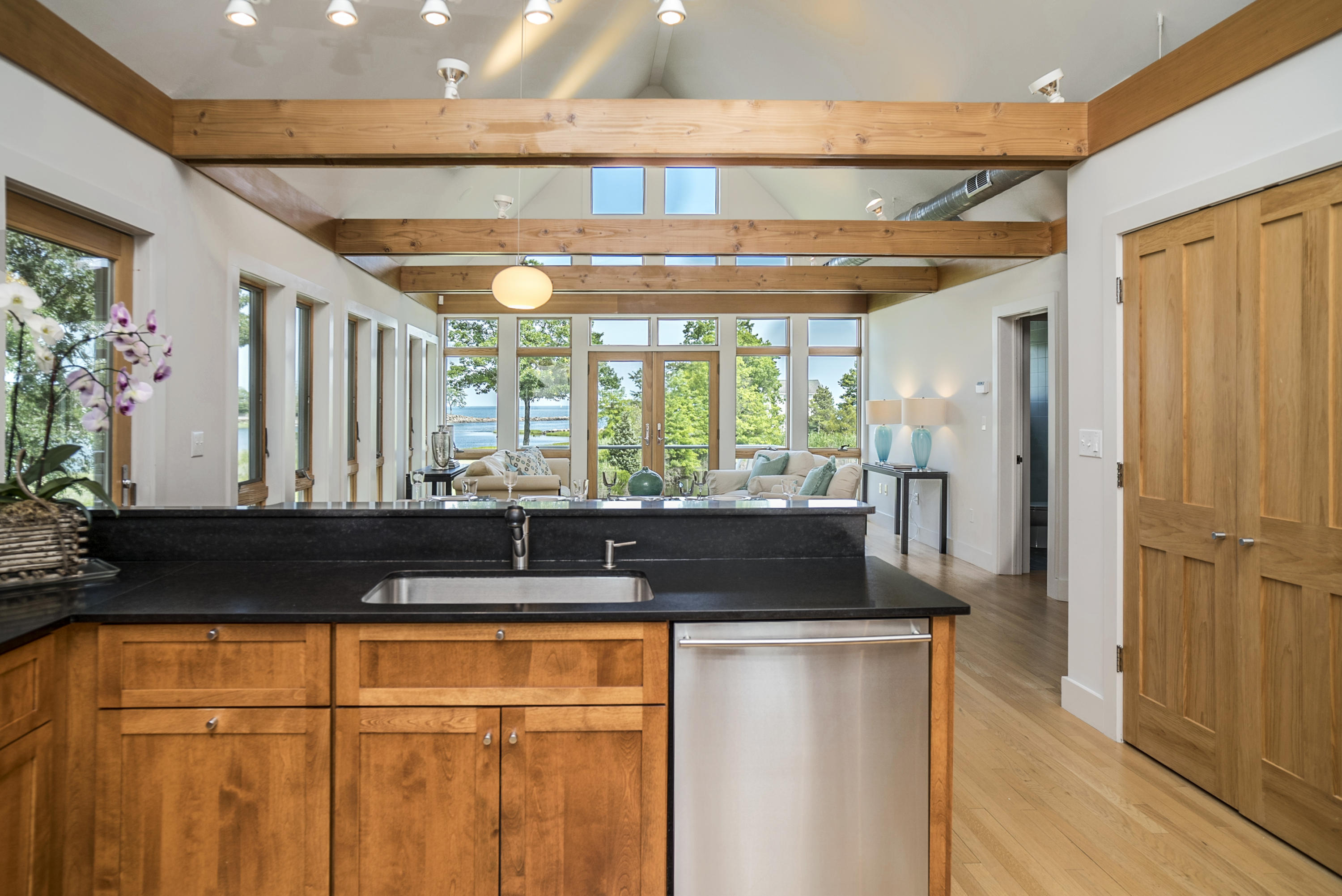52 Shorehaven Road Westport, CT 06880 - Photo 15 of 37 a kitchen with granite countertop a sink and a large window