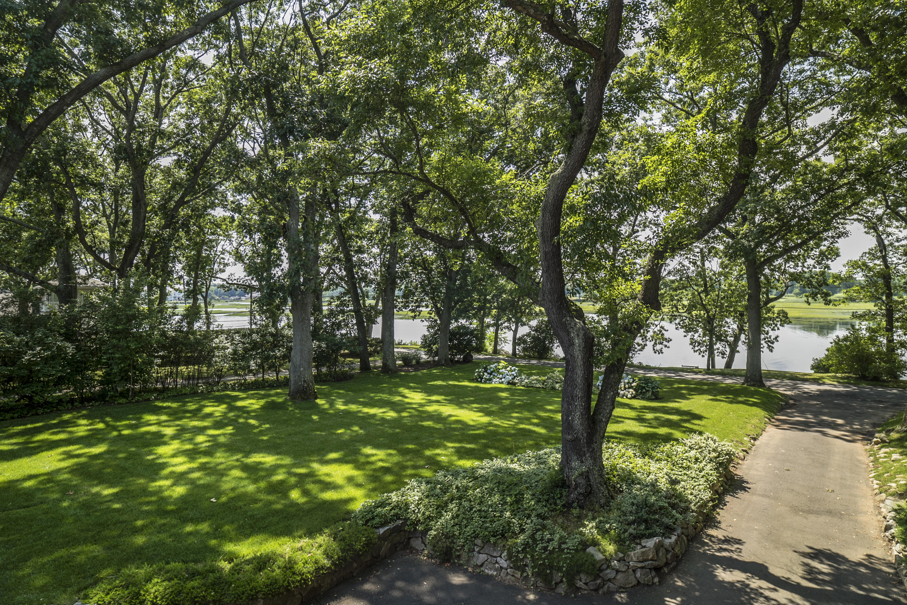 52 Shorehaven Road Westport, CT 06880 - Photo 19 of 37 a big yard with lots of green space and trees