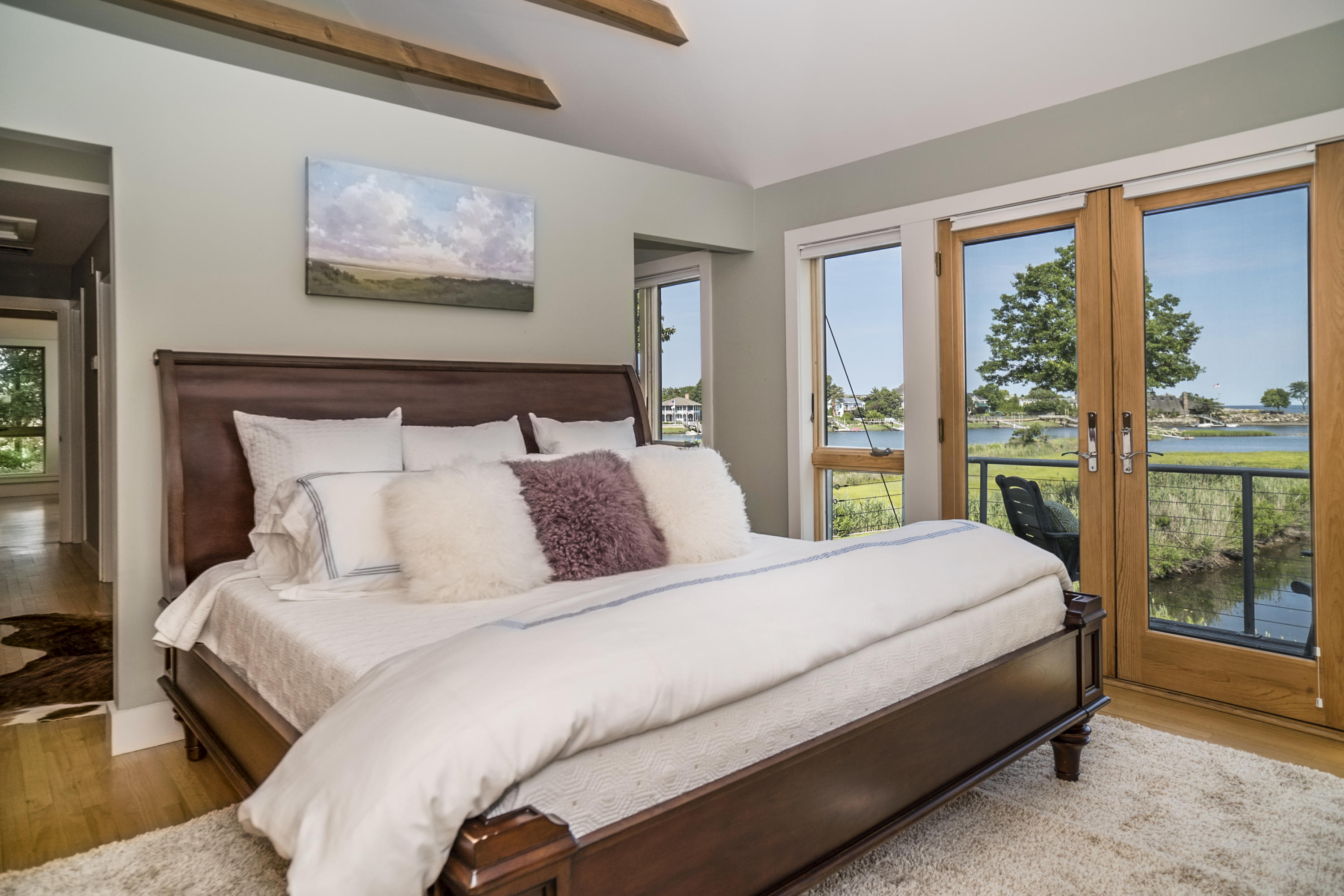 52 Shorehaven Road Westport, CT 06880 - Photo 23 of 37 a bedroom with a bed painting and a large window
