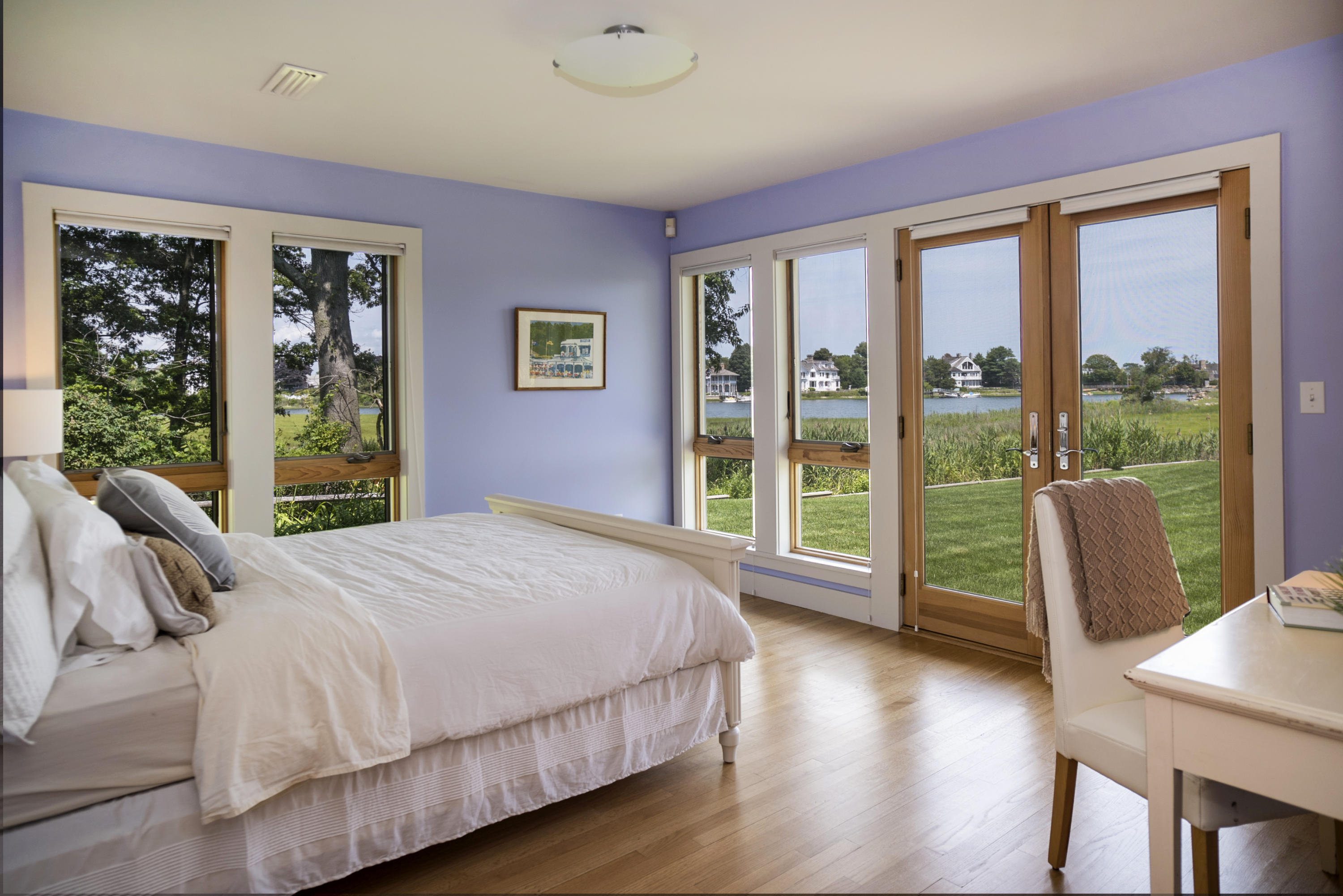 52 Shorehaven Road Westport, CT 06880 - Photo 26 of 37 a bedroom with a large bed and a large window