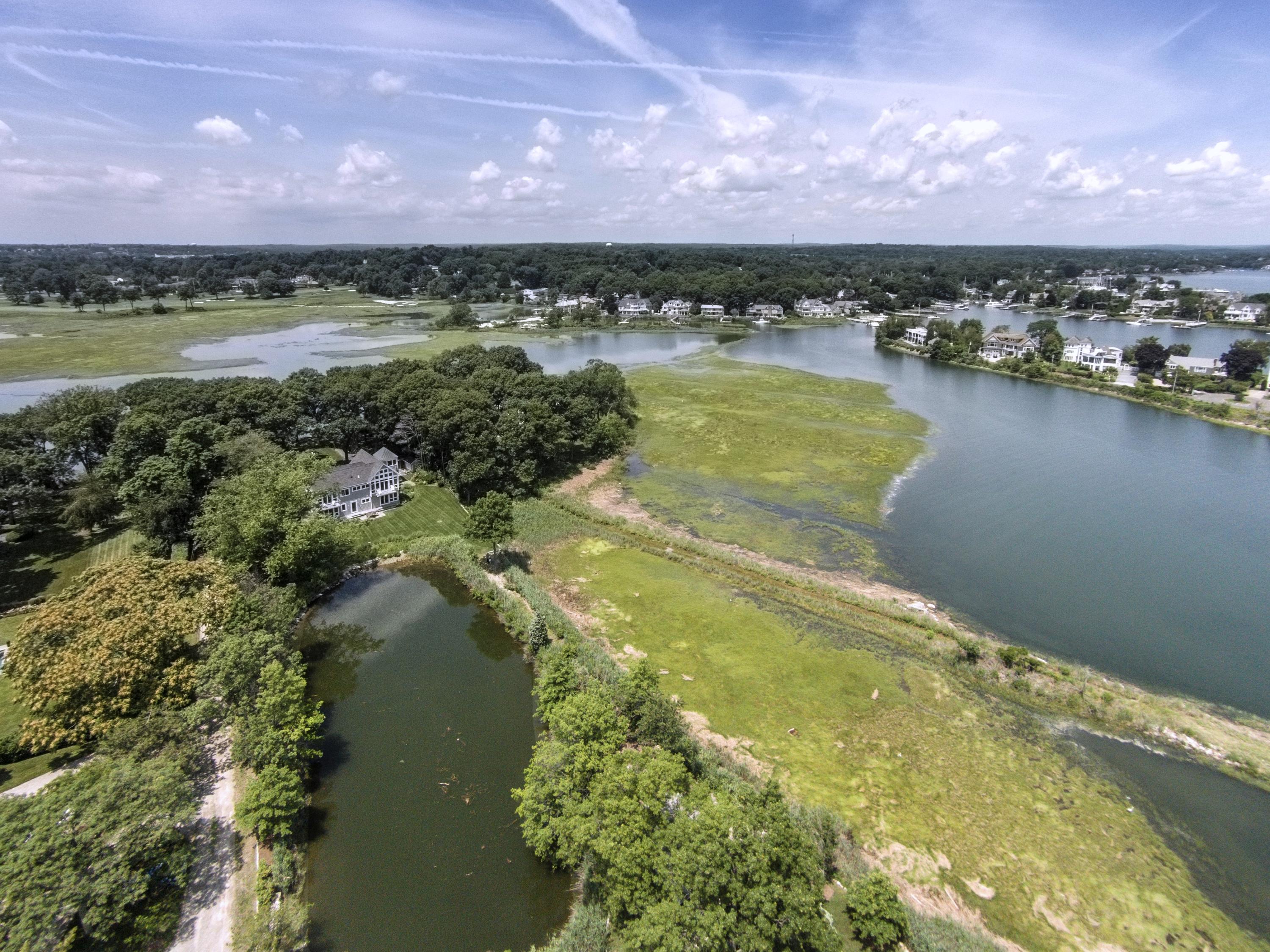52 Shorehaven Road Westport, CT 06880 - Photo 3 of 37 a view of a lake in middle of the town