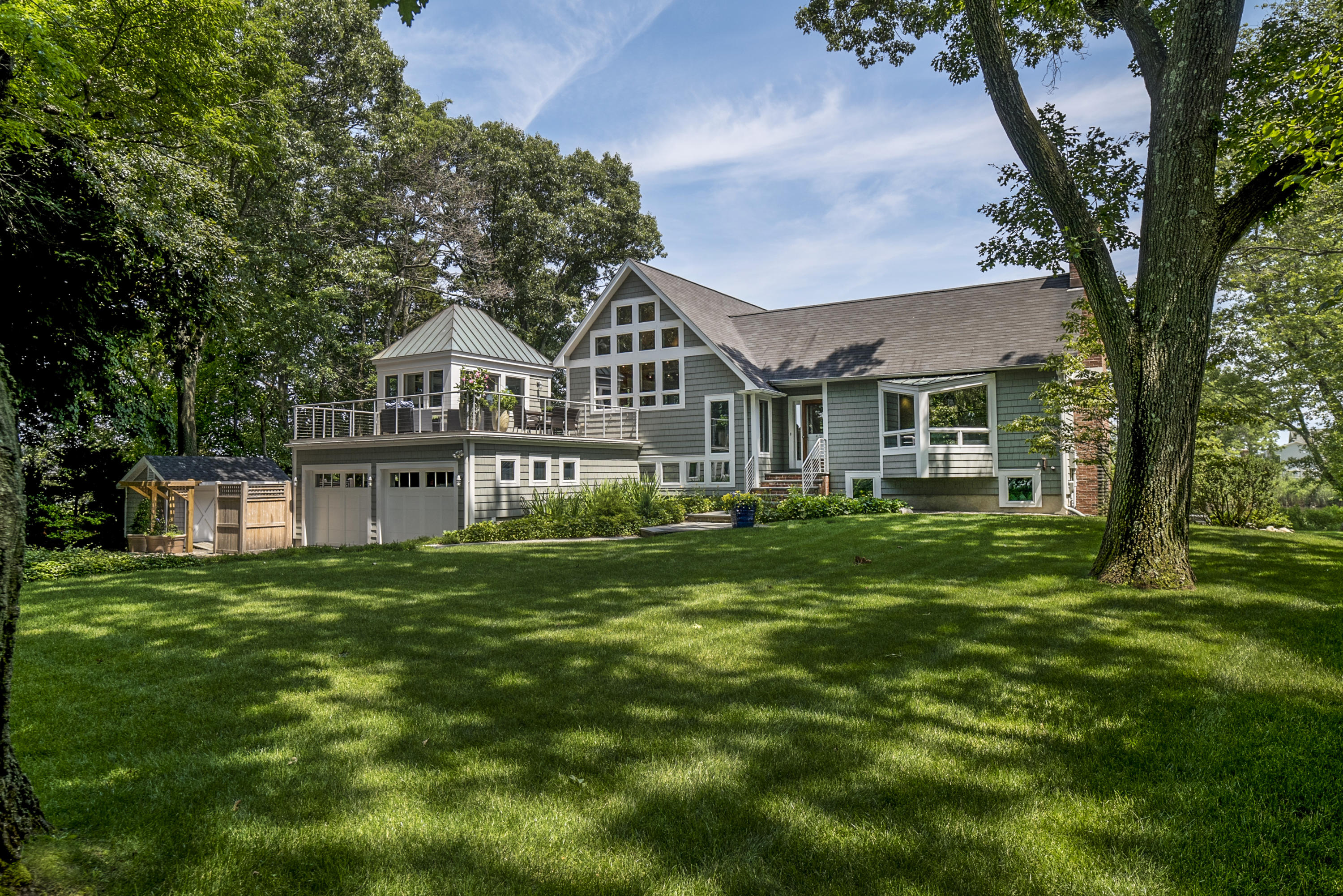 52 Shorehaven Road Westport, CT 06880 - Photo 31 of 37 a front view of a house with a garden