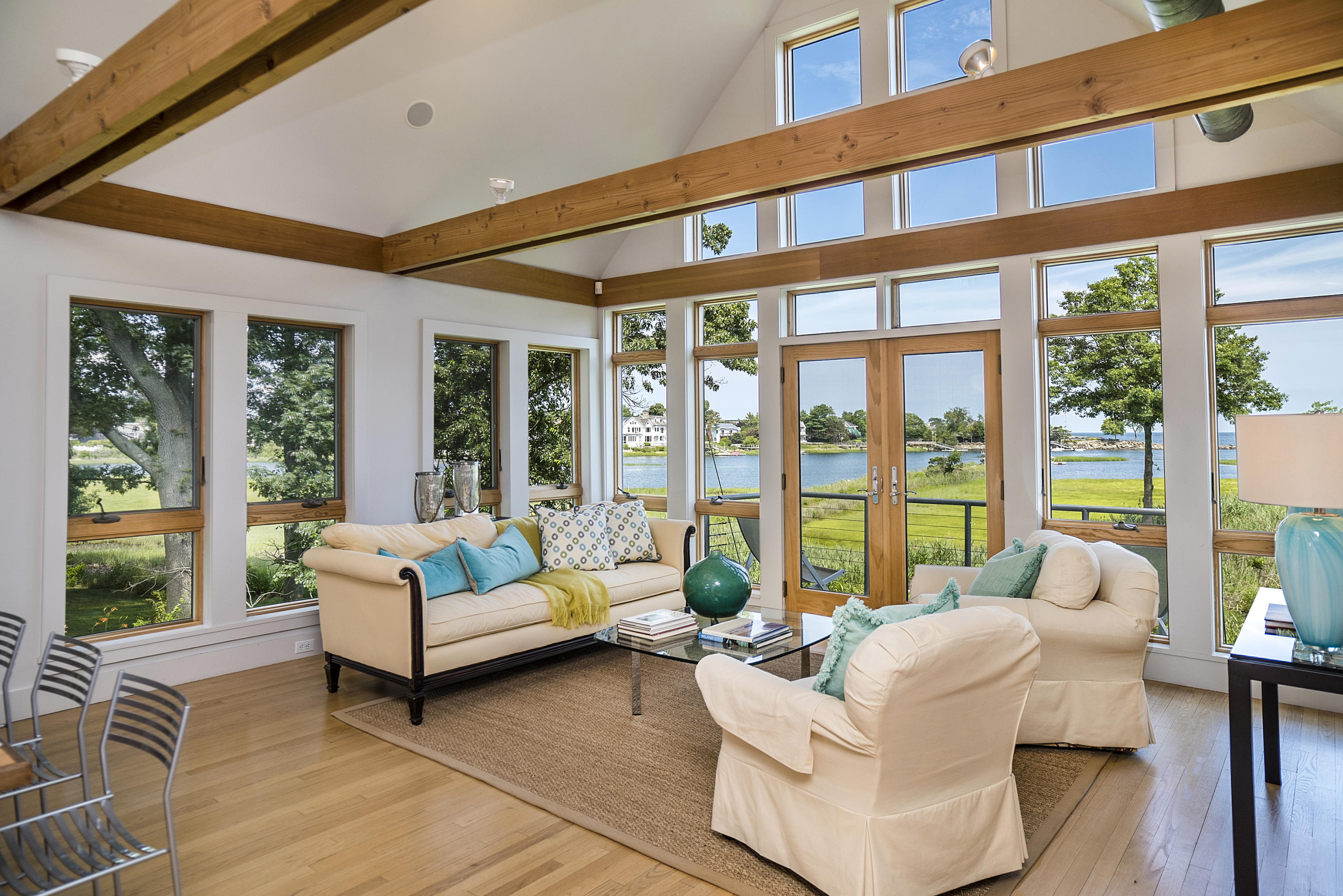 52 Shorehaven Road Westport, CT 06880 - Photo 9 of 37 a living room with furniture and floor to ceiling windows
