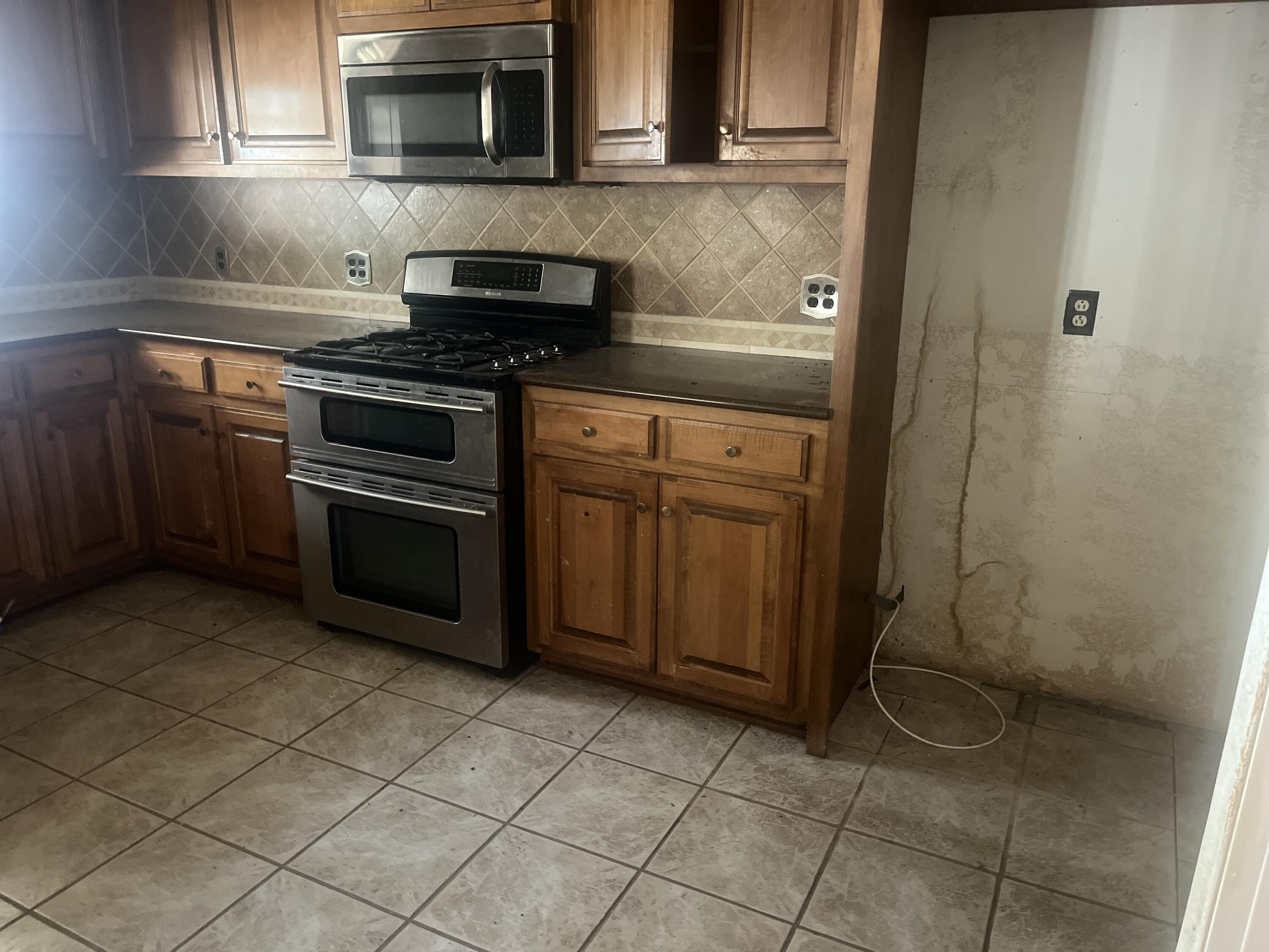 3013 66th Street Lubbock, TX 79413 - Photo 3 of 30 Kitchen Angle