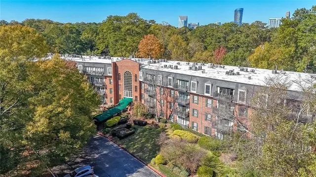 a view of a balcony with an outdoor space and seating area