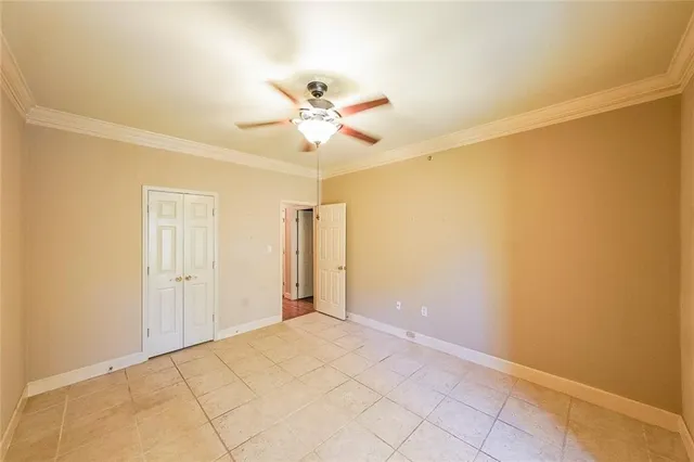 a view of a room with a hanging light