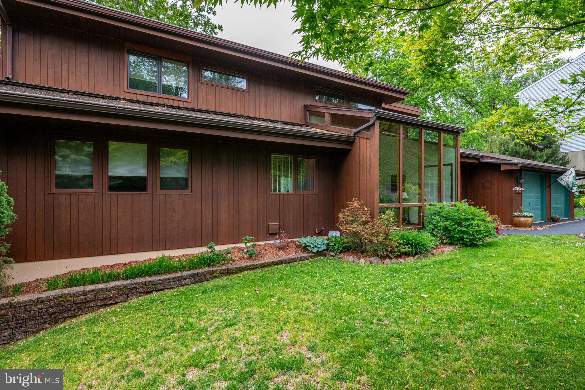 40 Golfview Lane Reading, PA 19606 - Photo 4 of 48 a front view of a house with a yard and potted plants