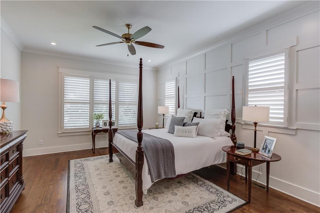 1894 Point River Drive Duluth, GA 30097 - Photo 7 of 17 a bedroom with a bed and a table in it
