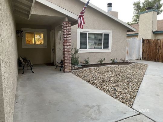 509 South Appaloosa Street Ridgecrest, CA 93555 - Photo 25 of 26 a front view of a house with windows