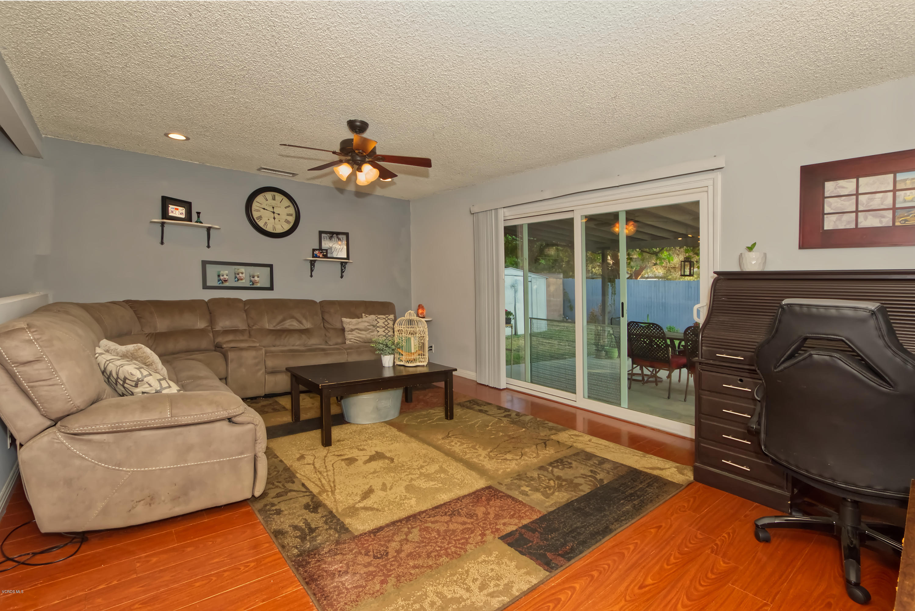 797 Appleton Road Simi Valley, CA 93065 - Photo 3 of 21 a living room with furniture and a window