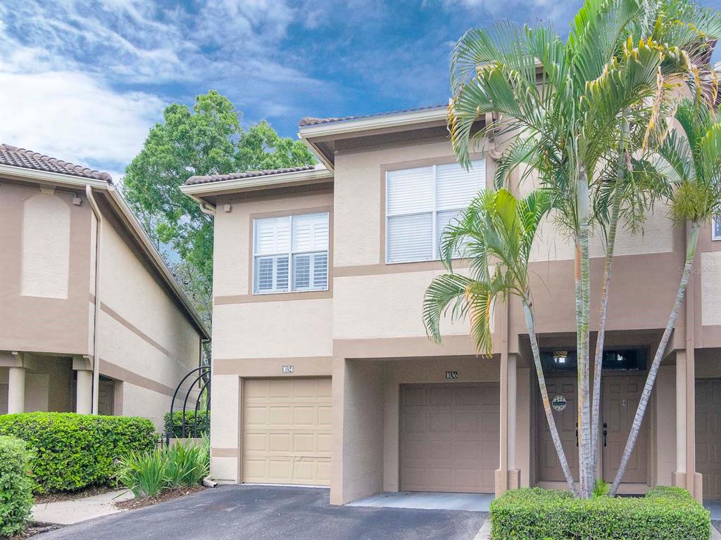 1036 Normandy Trace Road Tampa, FL 33602 - Photo 2 of 31 a front view of a house with a yard