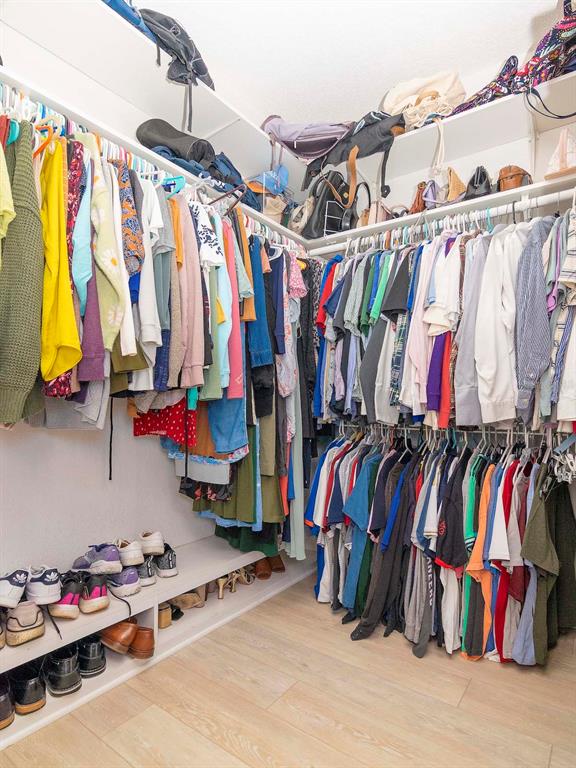 1036 Normandy Trace Road Tampa, FL 33602 - Photo 23 of 31 a view of walk in closet with clothes and shoes