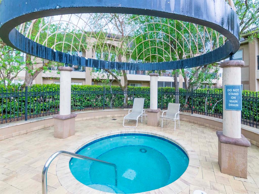 1036 Normandy Trace Road Tampa, FL 33602 - Photo 30 of 31 a view of outdoor sitting area with furniture and garden view