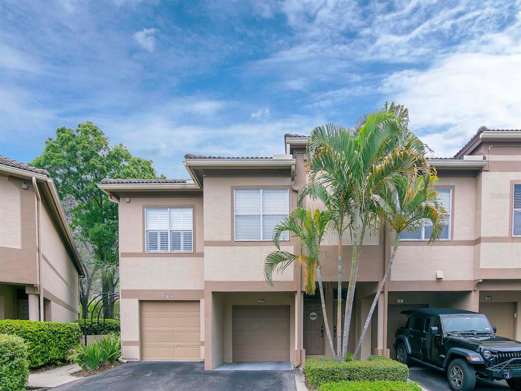 1036 Normandy Trace Road Tampa, FL 33602 - Photo 3 of 31 a front view of a house with garden