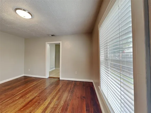 wooden floor in an empty room with wooden floor