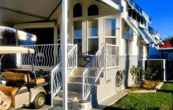 a view of a house with parking space