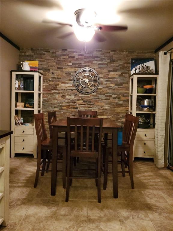 119 North Eberhart Road Butler, PA 16001 - Photo 3 of 18 Accent tiled wall. Tiled flooring fresh paint make this dining area a great place for families to enjoy meals.