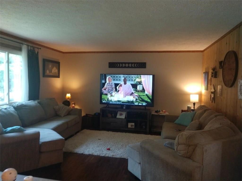 119 North Eberhart Road Butler, PA 16001 - Photo 5 of 18 Light filled living room with room for the family to enjoy TV time.