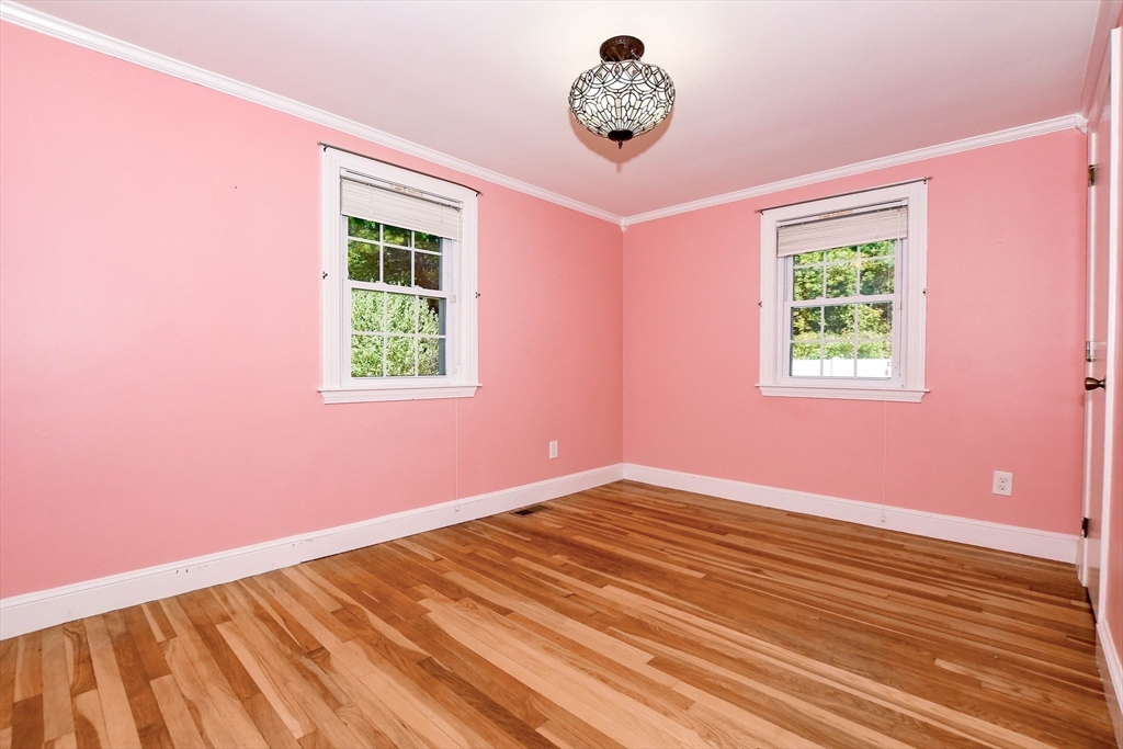 1251 Broadway Hanover, MA 02339 - Photo 18 of 39 a view of an empty room with a window