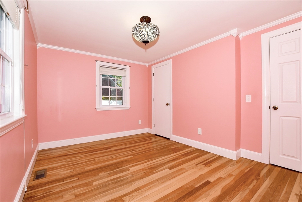 1251 Broadway Hanover, MA 02339 - Photo 20 of 39 a view of an empty room with a window